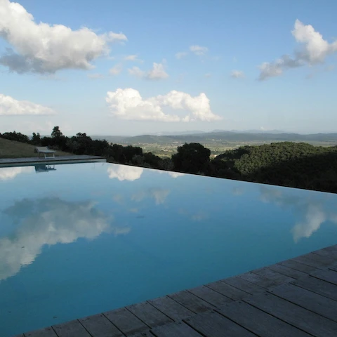 infinity pool reflecting endless sky