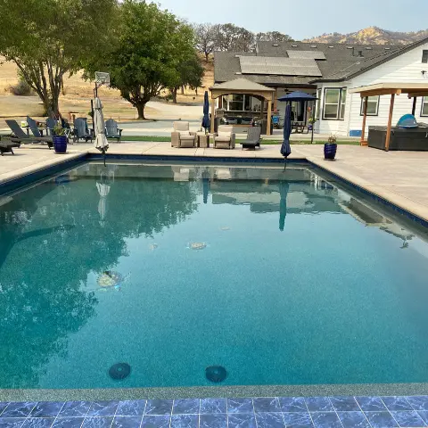Rectangular Pool in Countryside Manor Backyard
